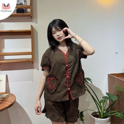 Đồ du lịch biển mặc gì cho đẹp với bộ áo túi giả tim